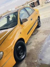 مكلف بلنشرررر نيسان صني رقم بغداد وكاله وتحويل مصفره هيئه وغرامات 2002...