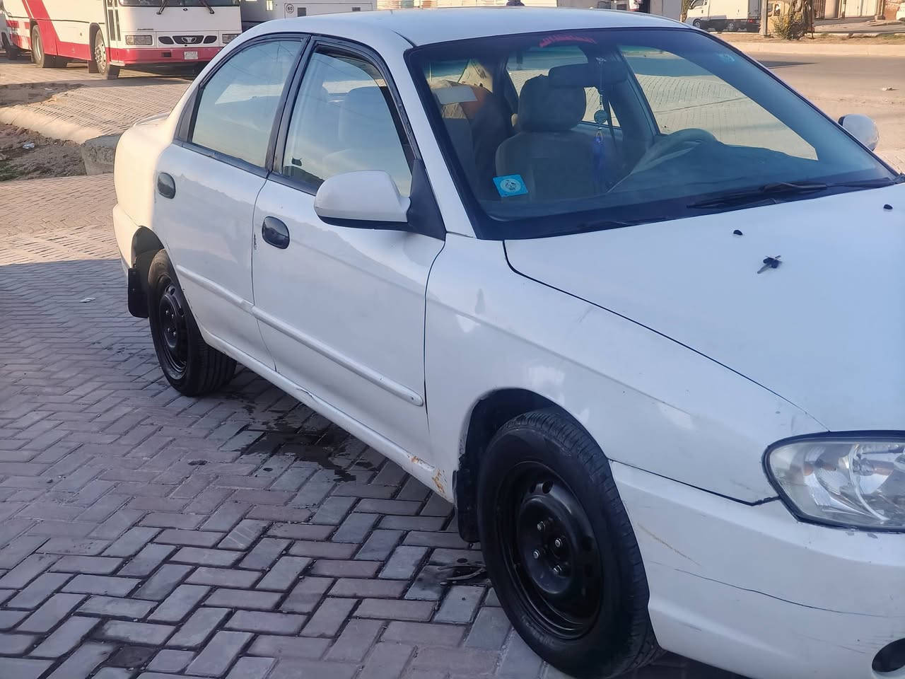 للبيع او لمرواس حسب القناعه كيه اسبكتره نضيفه كير ومحرك خير من الله السياره رقم انكليزي بغداد صدرها جديد محرك 2000  يعوزها كمبريسر تبريد كل تفرعاتها جاهزه كهربائيات كلها شغاله دوخلها غرفتها حلوه دوشمه وكاعيه جدد سياره بيها صبغ جاملغ مال السايق فقط ابمكان بغداد الكماليه السعر المطلوب 48 وبيها مجال رقم الهاتف  ***********
