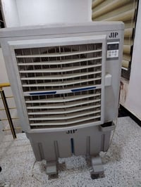 كنفيره جديده َمستعمله شهري السعر ١٠٠ الف تواصل 07730901218