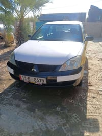 للبيع لانسر موديل 2010تحويل بسمي رقم دولي صدر امامي خلفي جديد سياره خي...