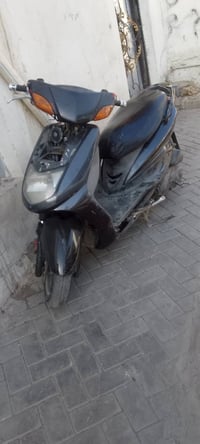 دراجة يابانية • ١١٠ سي سي • مكفولة مكينة