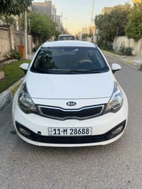 كيا ريو خليجي موديل 2014 محرك 1600دوش  رقم بغداد شرط التحويل  مكينه كي...