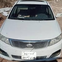 أوبتيما • ٢٠٠٩ • مكينة ٢٠٠٠