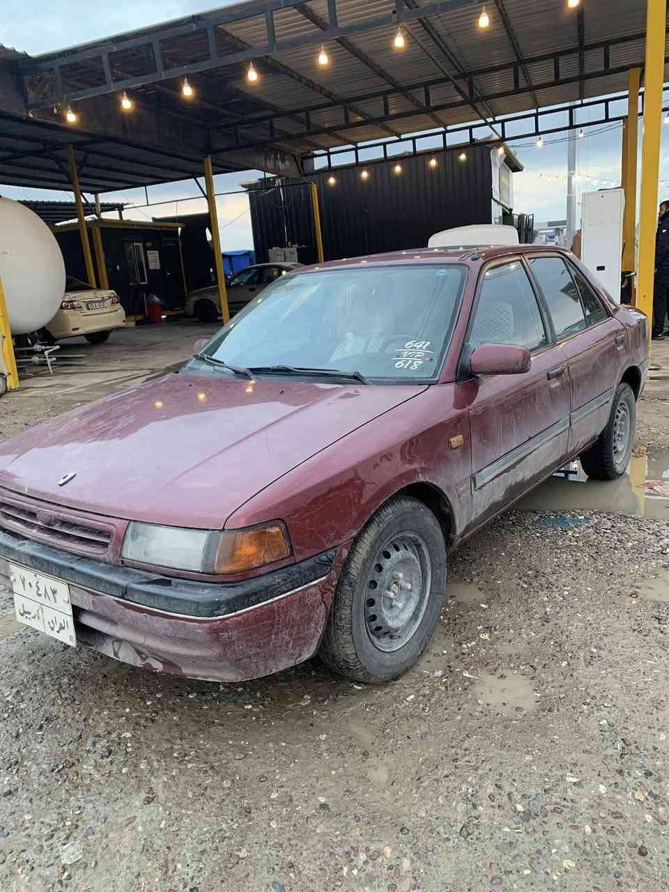 مازدة 323  موديل ١٩٩٤ سلات گير و مةكينة بةشةرت  بةناو كردن بةشةرت تةقةو رةقةى بةشةرت  سحر ٤٤  غرامةشى لةسةرة ٤٨٠ هةزار دواى مةحةكةل بوت دةگةرينمةوة ..***********
