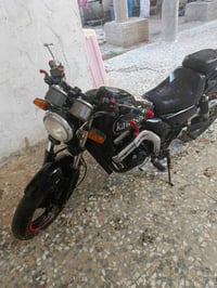 دراجه موديل 2004 للبيع السعر 1500 وبيها مجال هذا رقمي07703457175