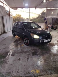 اكسنت تك باب وارد امريكي 2008 بيها جاملغ امامي بدون دواخل ومصبوغه حزام...