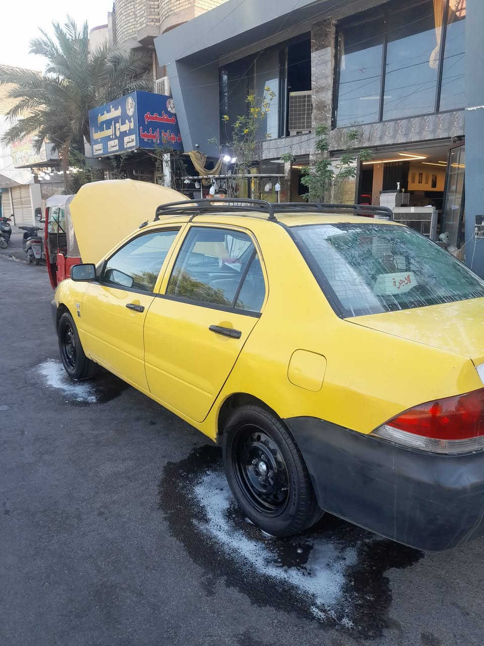 سلام عليكم لانسر مديل 9 شركه عامه سنويه لل30 بيها هاي الضربه الي كدامكم مكينه2000 قبل شهر  مجفته تجفيت ع ادينه رنك عمل انسه حماوه عينه وصينيه قبل ٥ ايام شادهن بس التبريد ميشتغل مشكلته بلكهربائيات  سياره كاعده ومرتبه مال شغل تجي وتشوف وتقتنع وتأخذ شوف العين احسن من الصور والصوره ذني الصبح اخذتهن حته متكولون قديمات سعر ،58 وبيها مجال مكانها بغداد الشعله(***********)
