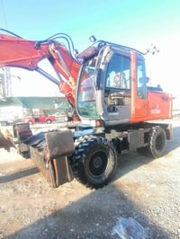 حفارة هيتاشي160 زت تاير 2005 07724723444