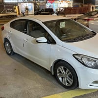 وبركاته سياره سيراتو موديل 2014 رقم اربيل الدولي الانكليزي السعر 118 و...