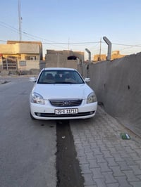 كيا اوبتيما وارد امريكي ضرر جاملغ وباب محرك ٦ سلندر ٢٧٠٠. سياره صدر ام...