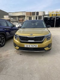 كيا سلتوز فئة (SX) 2021 وارد امريكي اللون ذهبي  محرك 1600 تيربو رقم ار...