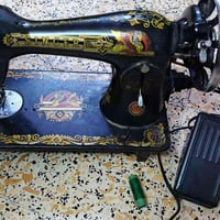 مكينة خياطة • سنجر • قديمة