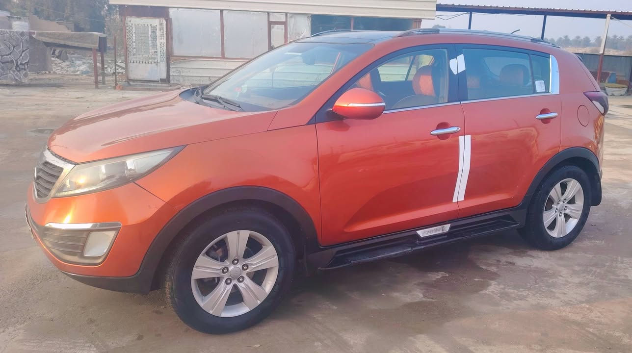 كيا سبورتج خليجي للبيع موديل 2012 - محرك 2000
رقم بغداد انكليزي الجديد بأسمــــي وتحويل مباشــــــــر
صبغ قطعتين فقط باب خلفي وجاملغ تجي تفحص كلشي 
( محرك  -  كير  -  صدر  -  تبريد  -  تدفئة ) خير من الله
مواصفات (كرسي كهربائي - إشارة بالمرايا - مرايا شفط -
فتحة سقف بانورامـــــــا - كاميرا خلفية - تحكم استيرن)
مكانها /  بابل - جبله  -  سعرها / 135 ورقة وبيها مجال
للإستفسار الاتصال على الرقم ***********
