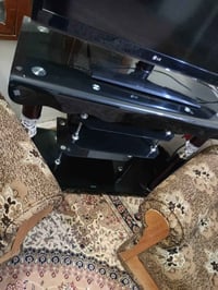 نص تخم قنفات مكون من عدد 1 كبير و2 صغير مع ميز تلفاز زجاجي اكتب سعرك و...