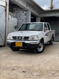 نيسان نافارا • ٢٠١٢ • غاز