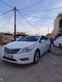ورحمه الله للبيع ازيرا 2014 خليجي  رقم شمالي بأسمي  بيها تبديل باب وجا...