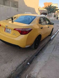 كورله تكسي سنويه بسمي رقم بغداد سنويه صار شهرين صاقطه نقابه مصفر موديل...