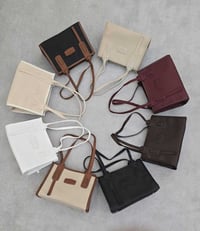 حقائب نسائية • جملة • فحص أمام المندوب