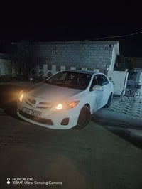 كورلا لبيع كندي 2011 رقم شمال سنويه جديد دفتر بنزين موجود سياره بدون ص...