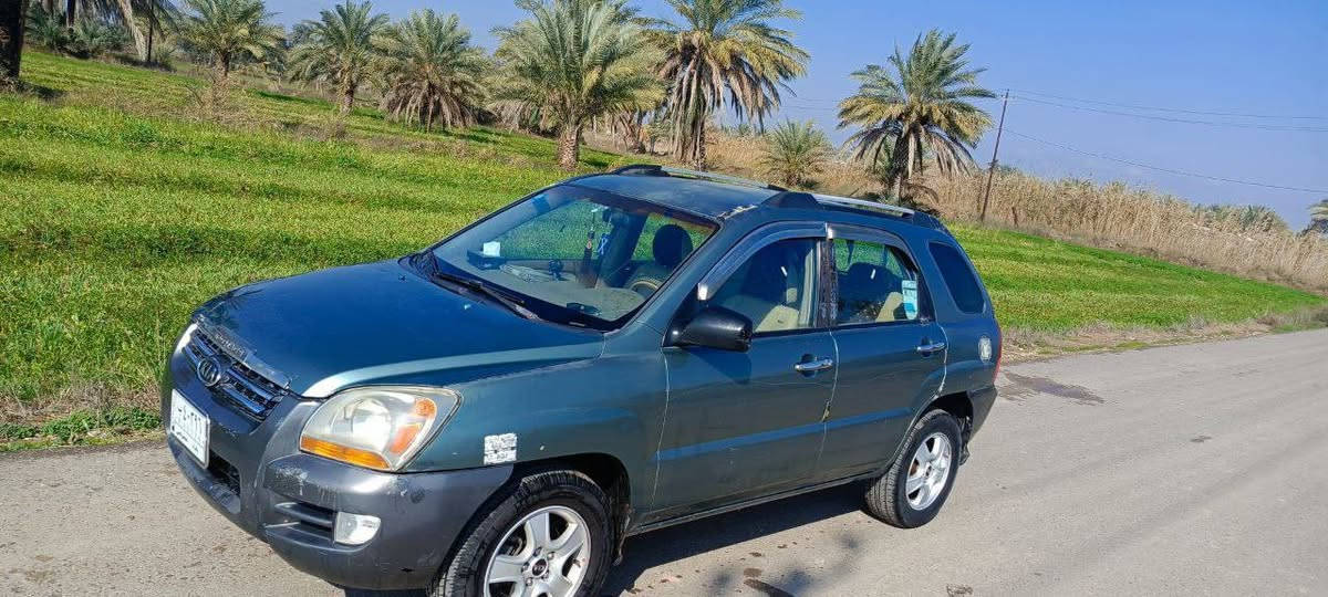‏‪***********‬‏سلام عليكم اسبورتج البيع موديل2007اوارد امريكي مكينه 2000 بيه بس جاملغ امامي امبدل او صبغته كاشفه شويه يعن يرادله شويه السياره ابسمي مكاني بغداد تبريد يشتغل بس ما يبرد ما   السعر 95  او بيه مجال
