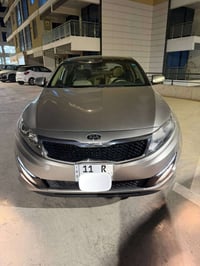 : كيا أوبتيما 2014 خليجي لون شمباني ماشيه 104 الف ( بيهه چاملغ صبغ/ وب...