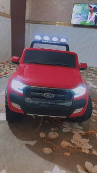 سيارة أطفال شحن سعره 200 وبيه مجال 07719697629