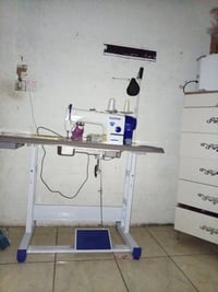 مكينة خياطة • استخدام أسبوع • كاتم صوت