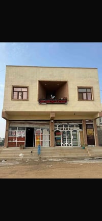 عمارة تجارية • حي التوحيد • ١٠٠م