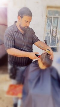 حلاقة مجانية • عوائل متعففة • واسط