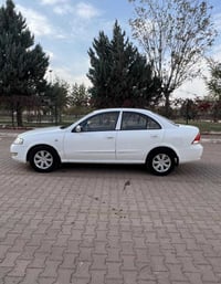 نيسان صني ٢٠١١ ئوتوماتيك دوو دةرگة سبوخ + بوستەک بولند سبخ  گيرو مكينة...