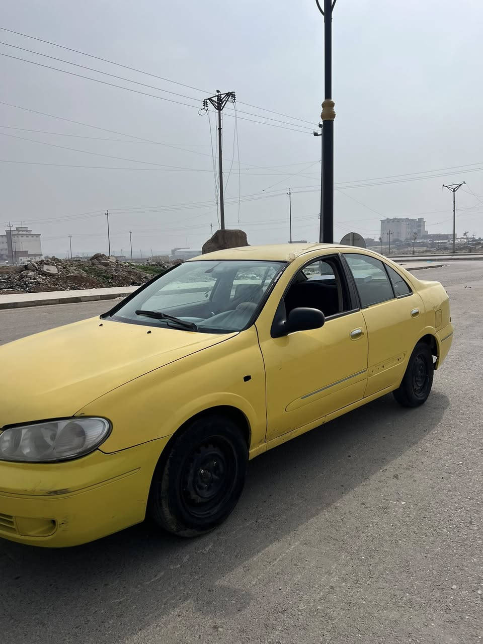 السلام عليكم نيسان صني٢٠٠٨للبيع  السيارة بيهاحادث ومعمرةمثل ماواضح بل صورة السعر٤٣وبيهامجال ***********عنوان السيارة بل موصل والشرعي بل  الناصرية تحويل مباشر
