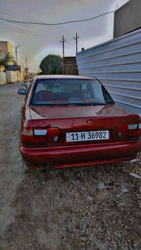 بروتون ٢٠٠٥ رقم بغداد دولي مصبوغة  عام اثر جراد  مع السونار رقم صاحب ا...