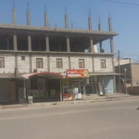 بناية تجارية • الحيدرية السماوة • ركن شارع تجاري