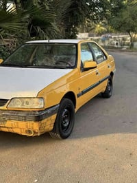 بيجو 405 موديل13 مكفوله من ضربه وصبغ  كير ومكينه مكفولات  حداديه امامي...