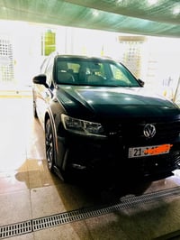 تيكوان 2021 فول مواصفات RLN رقم سليمانيه سياره جديده حادث بسيط جدا باب...