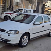 اوبل استرا 2002 مكفوله كفاله عامه  رقم بغداد دولي  تحويل مباشر  سياره ...