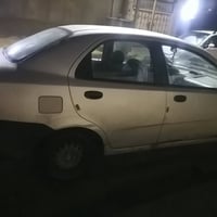 افيو٢٠٠٦رقم انكليزي مابيها صبغ بس شويا بجاملغ خلف السايق مكينة شرط بسم...