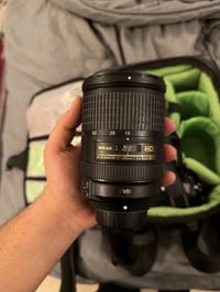 كامرة نيكون d7100 للبيع عدسة300-18 VR غنية عن التعريف عدسة 50mm 1.8  ج...