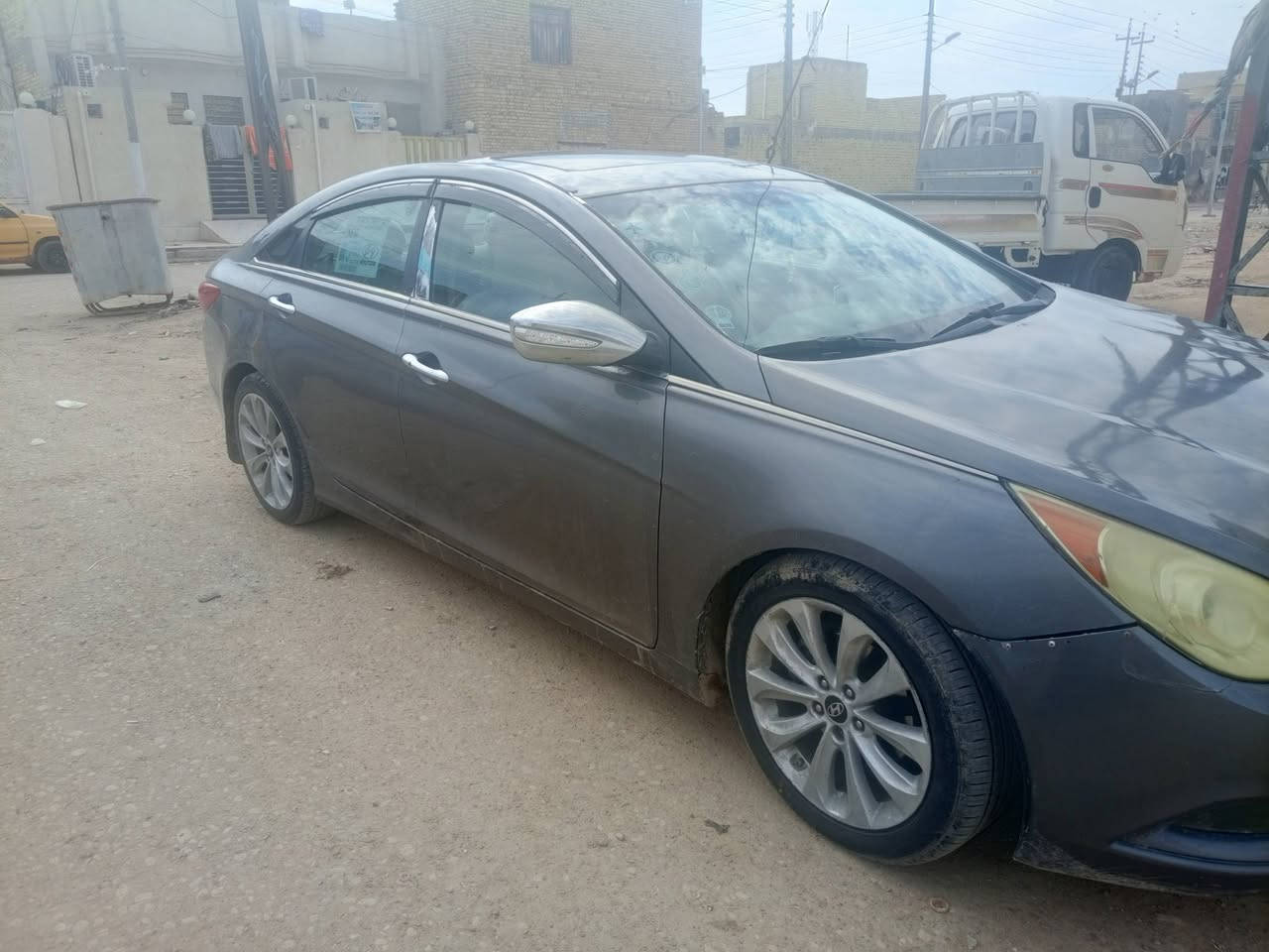 سوناتا للبيع موديل 11 سونار موجود بصور سياره جديده كير محرك تخم تايرات مكان السياره العماره ‏‪***********‬‏
