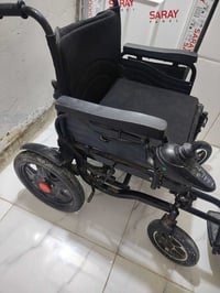 عربانة معاقين • جديدة • بطارية مضروبة