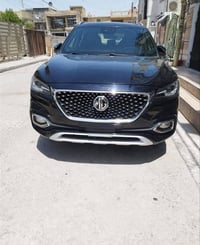 سيارة MG HS موديل 2021 محرك Turbo 2000 صورها موجودة مع صور الحادث سعره...