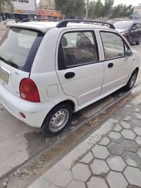 سياره كيو كيو موديل 2013 گير عادي  محرك خيط بخار حداديه وگير وكهربايات...