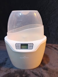 تسخين رضاعات • تعقيم • فتحتين