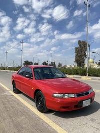 مازدا فاصوليا • ١٩٩٢ • ضرر خلفي