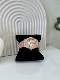 ساعة • سوار