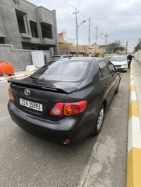 كورلا 2009 وارد امريكي محرك 1800 مصبوغه حزام  للاستفسار  07735452560