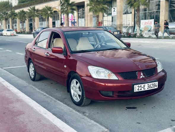 لانسر موديل 2009.          مه كينه گه وره       گير توماتيك. ناو زه رد        ناو فورميكا
بلاجكتور   ويل كه ب كوشن سياحي  جه كمه جه 
ده سك استيل جوار موكه به ره 
زور جوانه بي مه سره ف حيزام بوياغ بي ده عم  
سه نه وي تازه 
گيرو مه كينه و ته بريد به شه رت 
تحويل براؤه غه رامه به شه رت
تايه و ويلي لوك 
سه يه ره كه بي مه سره فه مالي دوسته 
سعر 80مه عمه له يه كي كه م 
ز. م ***********
***********
