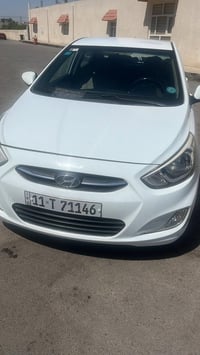 اكسنت للبيع موديل 2015 خليجي ماشيه 143  رقم بغداد الجديد سنويه وهزه جد...