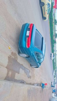 مازدا فاسوليا موديل ١٩٩٣ خليجي سه نه وي وه كاله رقم اسلي  بيش و بشت كه...