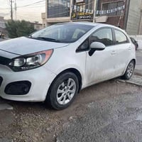 كيا ريو 2013 وارد امريكي بيها بس جاملغ فقط وبيها بل بنيد بارد فقط سيار...